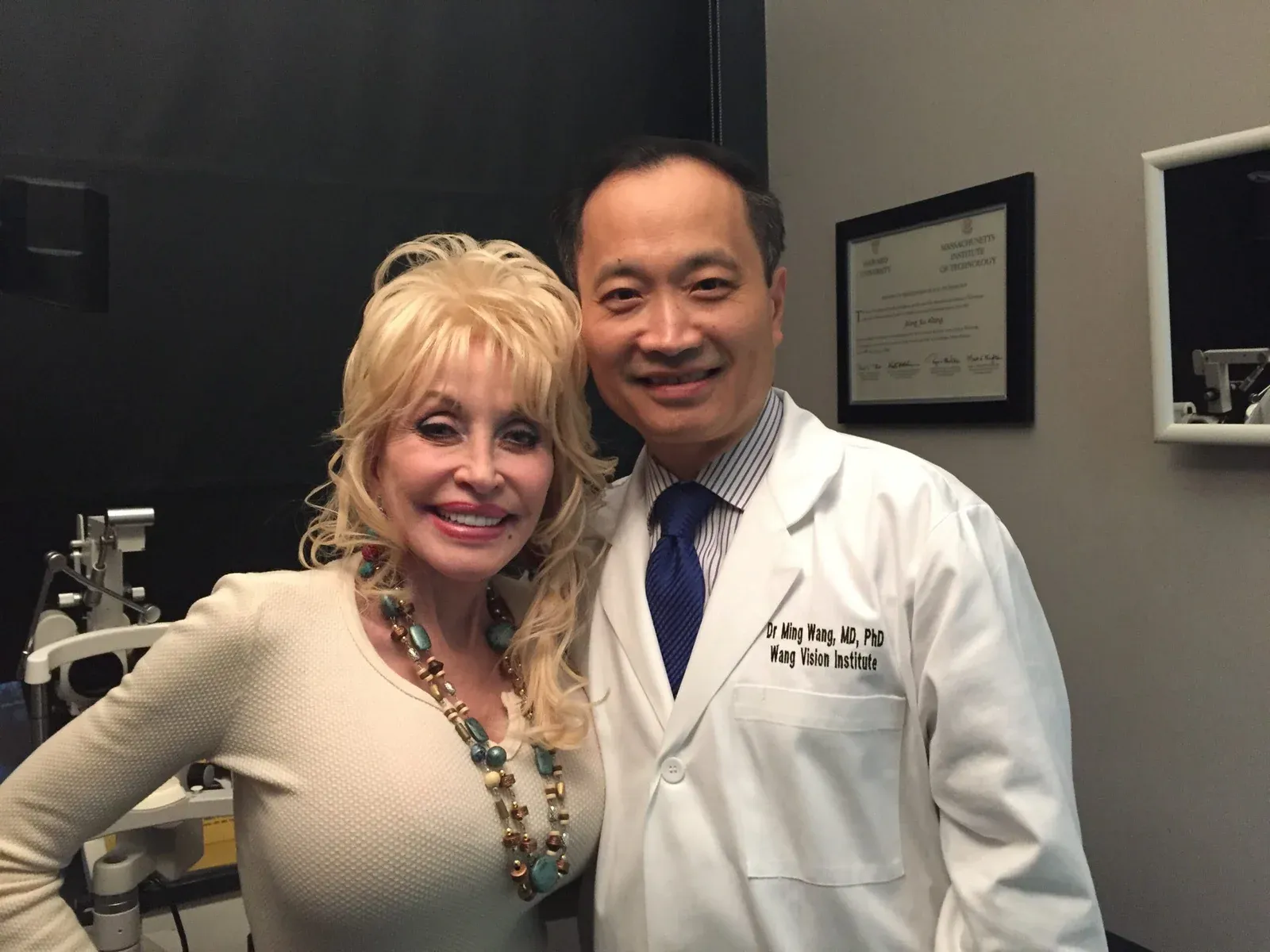 Dr. Ming Wang with patient Dolly Parton
